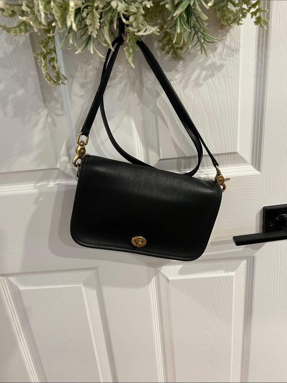 Coach Black Leather Turn-Lock Crossbody Bag with Gold Hardware